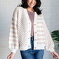 beige and white checkered and striped cardigan