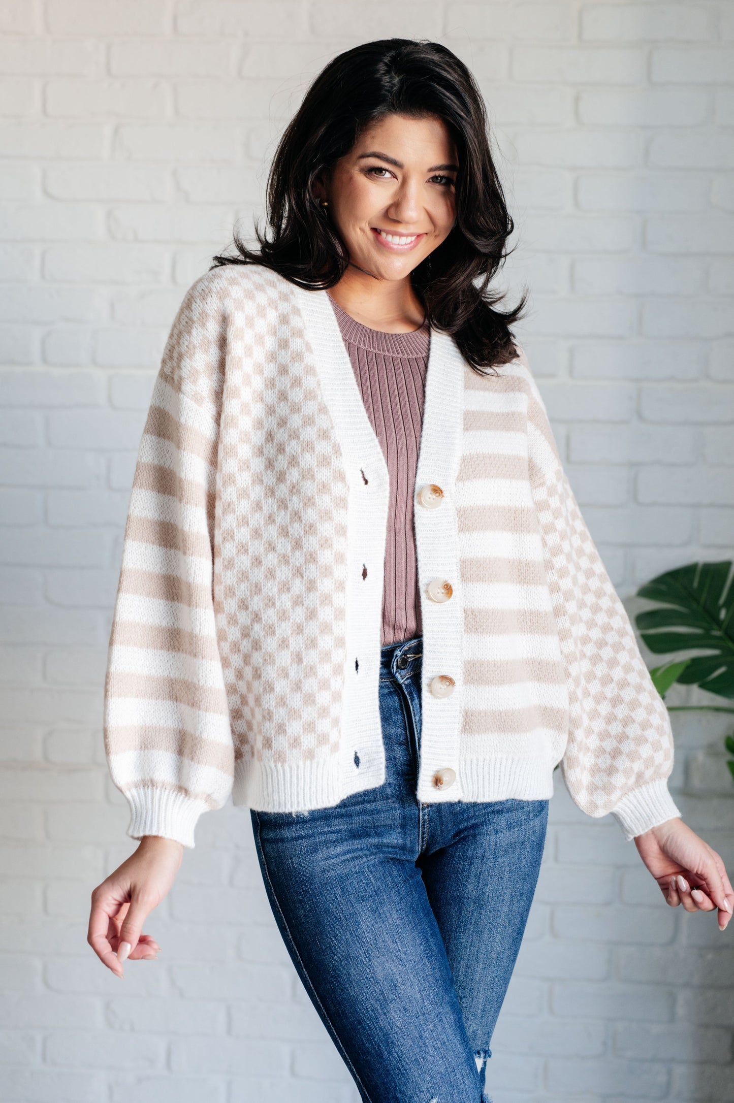 beige and white checkered and striped cardigan