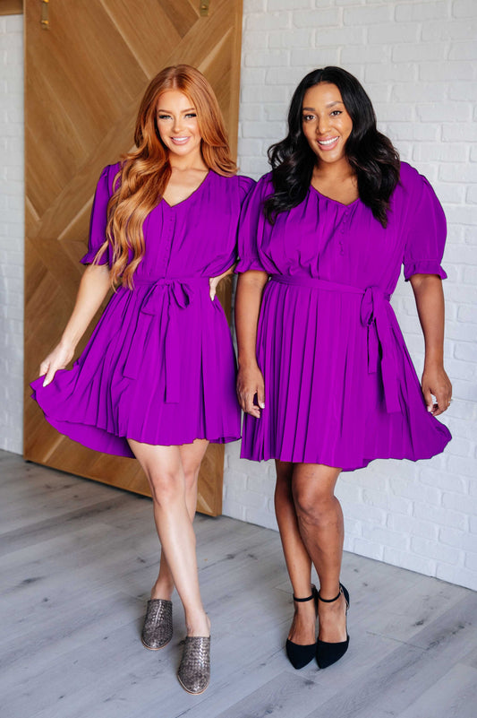 Purple knee length puff sleeve chiffon dress