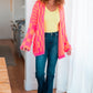 Noticed in Neon Checkered Cardigan in Pink and Orange