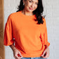 orange balloon sleeve sweater