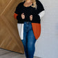 black, white, and rust long open front colorblock cardigan