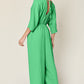 Casual Elegance Surplice Wide Leg Jumpsuit with Pockets