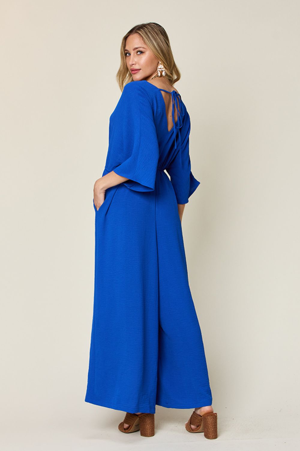 Casual Elegance Surplice Wide Leg Jumpsuit with Pockets